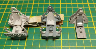 Kokpity před barvou - zleva doprava Brassin, Eda plast + Brassin sedačka, upravená Tamka + sedačka z Edy