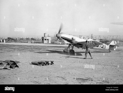 photo-of-a-german-fighter-type-messerschmitt-bf-109-of-the-fighter-squadron-88-of-the-condor-legion-during-a-take-off-on-a-spanish-airfield-at-the-rear-there-is-the-saltire-of-the-spanish-air-force-in-the-background-.jpg